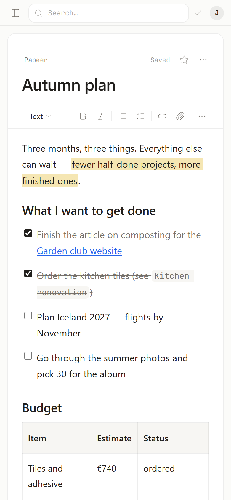 Papeer on a phone: a document with tasks and a table